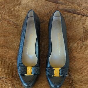 Salvatore Ferragamo Black Textured Leather Pumps with Gold Bow Accent